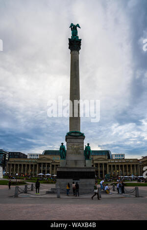 Stuttgart, Germany, August 15, 2019, Tall memorial pillar with statue on top called jubilaeumssaeule at schlossplatz square in downtown stuttgart next Stock Photo