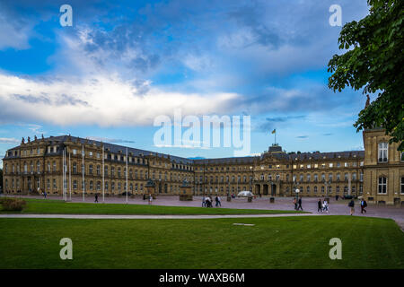 Stuttgart, Germany, August 15, 2019, Beautiful ancient new castle building in downtown stuttgart where many people walk by in summer at sunset at schl Stock Photo