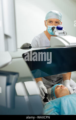 Nice mature man working in the hospital Stock Photo