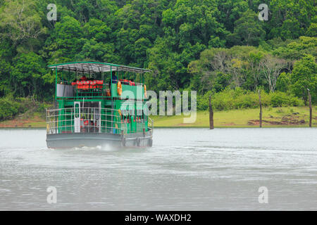 A boat cruise on Periyar Lake in Periyar National Park and Wildlife Sanctuary, Thekkady, Kerala, India Stock Photo