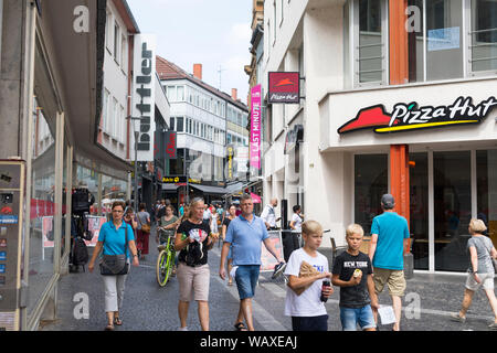 People walking at an inner city shopping street in Mainz, Germany Stock Photo