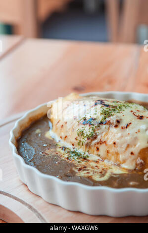 Japanese Kare Omu rice, Japanese omelette rice with curry Stock Photo