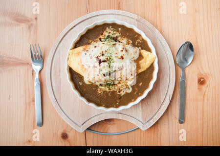 Japanese Kare Omu rice, Japanese omelette rice with curry Stock Photo