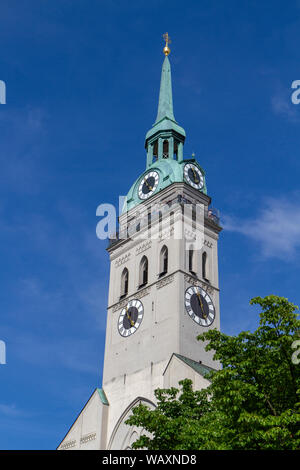 The spire of Peterskirche (St Peter's Church), a Roman Catholic church in Munich, Bavaria, Germany. Stock Photo