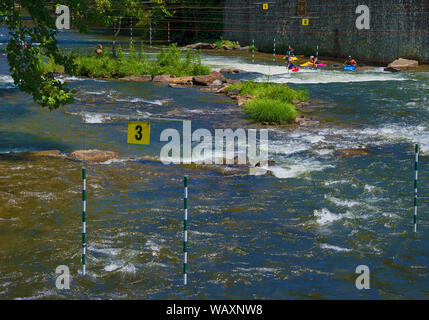 Bryson, North Carolina, USA - August 3, 2019:  Nantahala Outdoor Center's kayaking course on the Nantahala River. Stock Photo