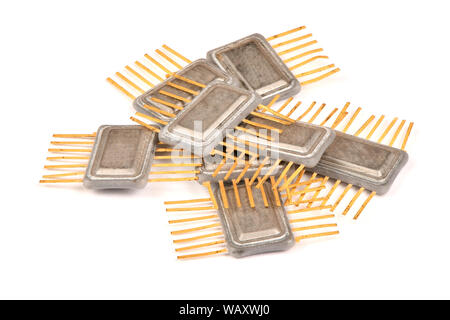 Old radio a component, an integrated chip in the metal case with the contacts covered with gold on a white background. High resolution photo. Full dep Stock Photo