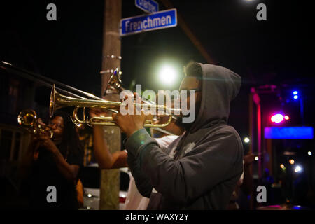 New Orleans, Louisiana - April 2, 2018: New Orleans Brass Band musicians playing Jazz in a corner of Frenchmen street. Stock Photo
