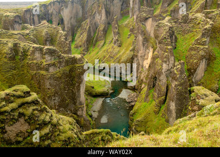 Fjadrargljufur canyon Iceland with steep mossy cliffs and crystal clear rivers in the South of Iceland Stock Photo