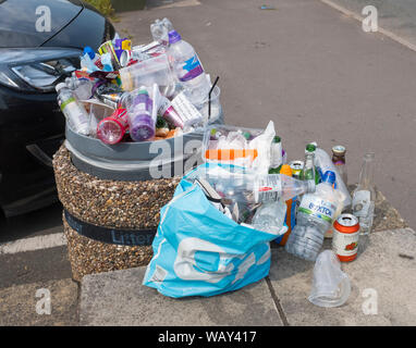 Overflowing litter bin at Shifnal carnival, Shropshire, England, UK Stock Photo