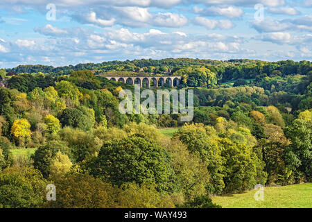 Railway viaduct over the River Dee viewed across Ty Mawr Country Park near Trevor in the Vale of Llangollen North Wales UK September 2018 Stock Photo