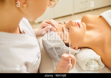 Beauty facial injections in beauty clinic. Stock Photo