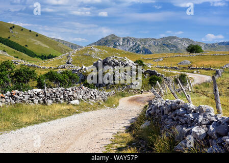 Rocky road to Lukomir - a distant village in the mountains of Bosnia and Hercegovina. Summer 2019. Stock Photo