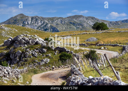 Rocky road to Lukomir - a distant village in the mountains of Bosnia and Hercegovina. Summer 2019. Stock Photo