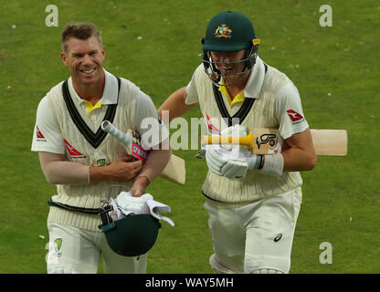 Leeds, UK. 22nd Aug, 2019. Marnus Labuschagne, and David Warner of Australia walks off after bad light stopped play during day one of the 3rd Specsavers Ashes Test Match, at Headingley Cricket Ground, Leeds, England. Credit: csm/Alamy Live News Stock Photo