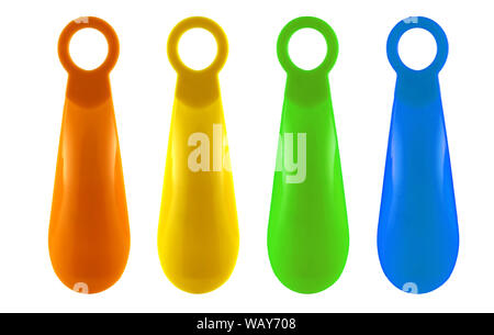 Set of colorful Shoehorns isolated on white background. There is orange, green, blue and red small spoon. You can put your shoes on comfortably. Stock Photo