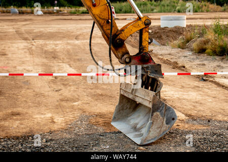 excavator shovel at road works Stock Photo