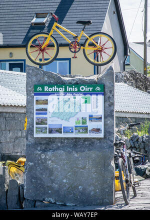 Sign in the Irish language on Inis Oirr, one of the Aran Islands, off the west coast of Ireland Stock Photo