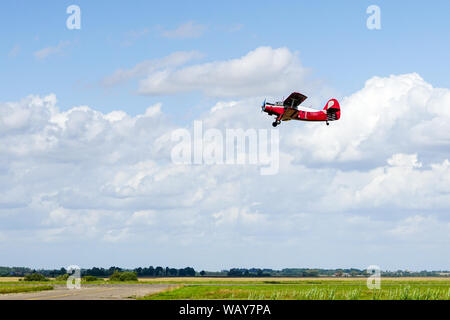 historical single engine airplane Antonov AN2 in flight Stock Photo