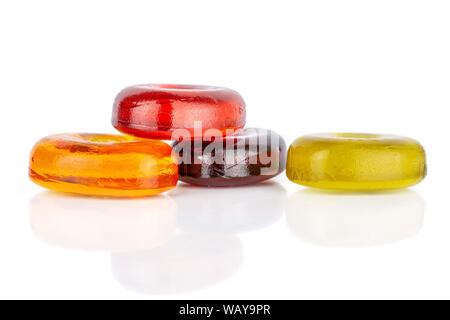 Group of four whole colourful hard candy cherry wine orange yellow isolated on white background Stock Photo