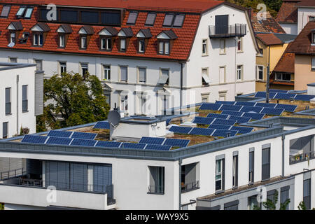 Freiburg im Breisgau, flat roof of a residential house, with photovoltaic panels, on a green roof, Stock Photo