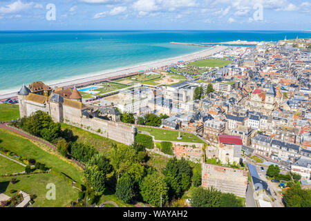 Aerial view of Dieppe town, the fishing port on the English Channel, at the mouth of Arques river. On a clifftop overlooking pebbly Dieppe Beach is th
