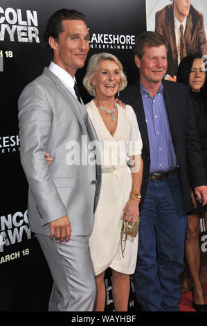 LOS ANGELES, CA. March 10, 2011: Matthew McConaughey (left), mother Mary Kathleen 'Kay' McCabe & brother Rooster McConaughey at the Los Angeles premiere of his new movie 'The Lincoln Lawyer' at the Cinerama Dome, Hollywood. © 2011 Paul Smith / Featureflash Stock Photo