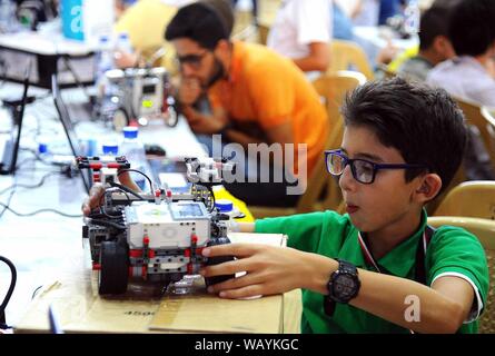 gave Født blive forkølet Damascus. 22nd Aug, 2019. A Syrian boy takes part in the qualification  match of the World Robot Olympiad in Damascus, Syria, on Aug. 22, 2019. The World  Robot Olympiad is scheduled to
