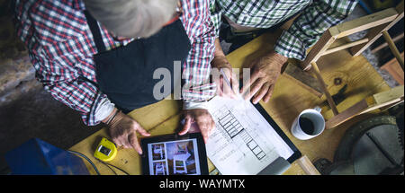 Senior couple in a carpentry Stock Photo