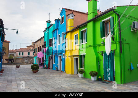 Brightly coloured houses on the island of Burano, Laguna Veneto, Italy Stock Photo