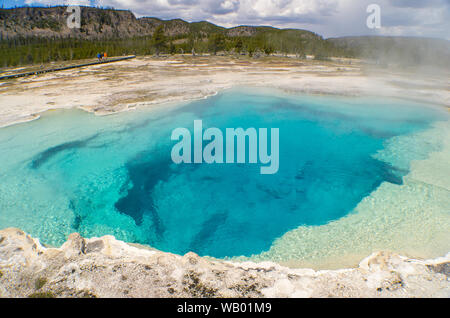 deep blue sapphire hot spring in the biscuit basin of yellowstone national park in wyoming.jpg Stock Photo