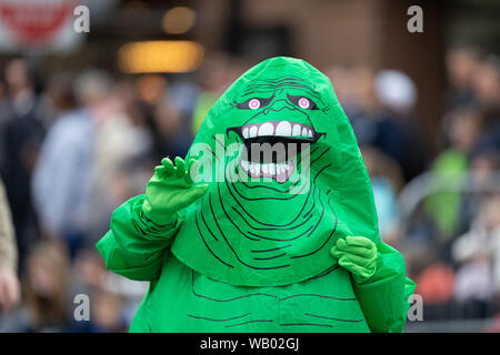 Holland, Michigan, USA - May 11, 2019: Tulip Time Parade, People dress up as Ghostbusters, promoting the Tulip City Ghostbusters during the parade Stock Photo