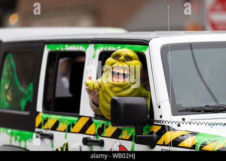Holland, Michigan, USA - May 11, 2019: Tulip Time Parade, People dress up as Ghostbusters, promoting the Tulip City Ghostbusters during the parade Stock Photo