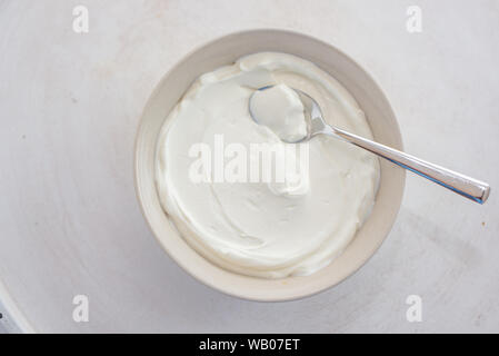 Download Yogurt cup with natural Greek yoghurt in plastic cup with ... Yellowimages Mockups