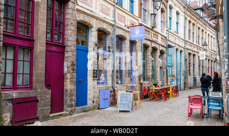 Rue des Vieux Murs with bars, restaurants and tourists. Rue des Vieux Murs is located in the historical neighbourhood Vieux Lille. Lille, France. Stock Photo