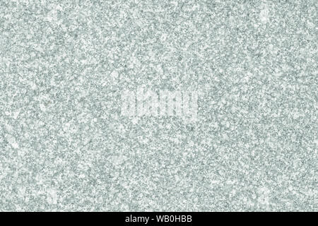 Light gray and white pitted background. Granite slab texture, surface. Natural pattern. Mottled frame, spotted card. Stone wall. Abstract grey dappled Stock Photo