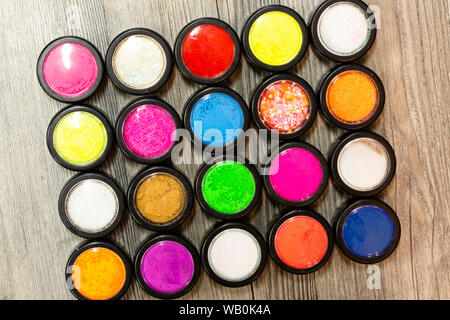 multicolor glitter used for mails art and photographed from above Stock Photo