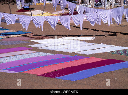 asia, asian, india, selection of batik coloured garments drying in the sun Stock Photo
