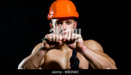 Mining area under construction. Muscular man worker. Hard worker with ...
