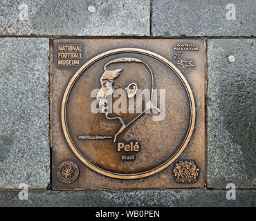 bronze plaque of brazilian footballer pele on the football walk of fame at the national football museum in manchester england uk Stock Photo