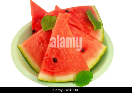 Fresh juicy watermelon berry in a plate isolated on white Stock Photo