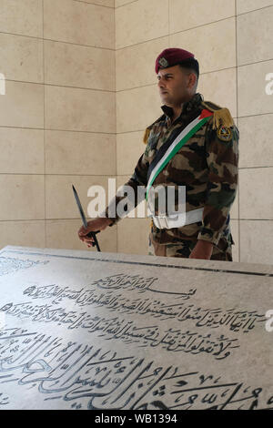 A Honor Guard stands at attention over Yasser Arafat's tombstone in mausoleum at the PNA Palestinian National Authority presidential headquarters in Ramallah a Palestinian city in the central West Bank in the Palestinian territories Stock Photo