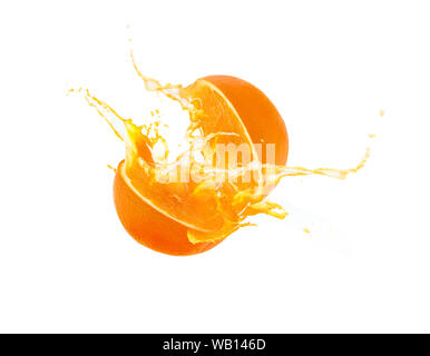 Fresh slide half of ripe orange fruit with orange juice splash water isolated on white background Stock Photo