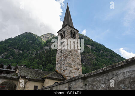 Alagna town situated in Piedmont , Italy. Town famous for snow sport activities , rafting , and tracking . Church of San Giovanni Batista Stock Photo