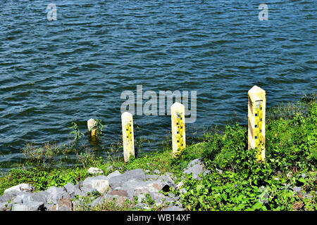 Water level gauge or Staff Gauge in dam , Thailand Stock Photo