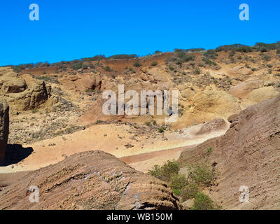 Lunar landscape of coarse and very light tufa and volcanic stones, in the Teno Mountains on the Canary Island of Tenerife. The wind and the weather ha Stock Photo