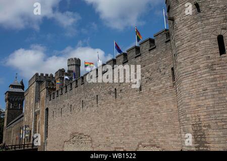 Cardiff, Wales, UK, August 23rd 2019. Rainbow flags adorn the walls of Cardiff Castle as the city prepares for Pride Cymru's big weekend celebrations. Credit: Mark Hawkins/Alamy Live News Stock Photo