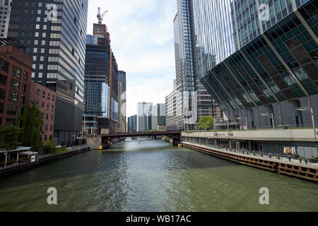 canyon of skyscrapers and buildings surrounding the chicago river as viewed from the lake street bridge chicago illinois united states of america Stock Photo