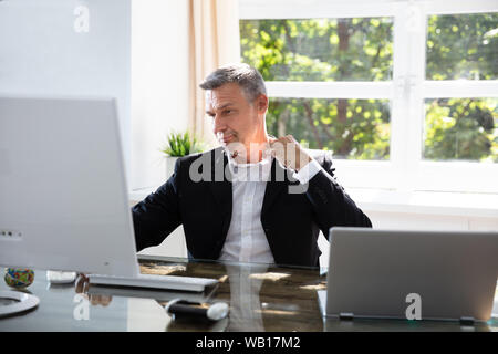Businessman Working During Hot Weather In The Office Stock Photo