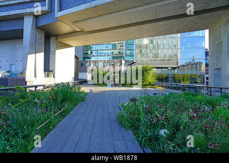 NEW YORK CITY, NY -11 AUG 2019- View of the High Line, an elevated green urban park running along old rail track lines in lower Manhattan, New York Ci Stock Photo