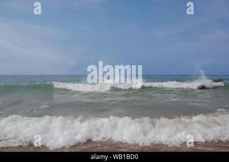 Windswept Heavy Surf, Waves crashing on Coastline Stock Photo